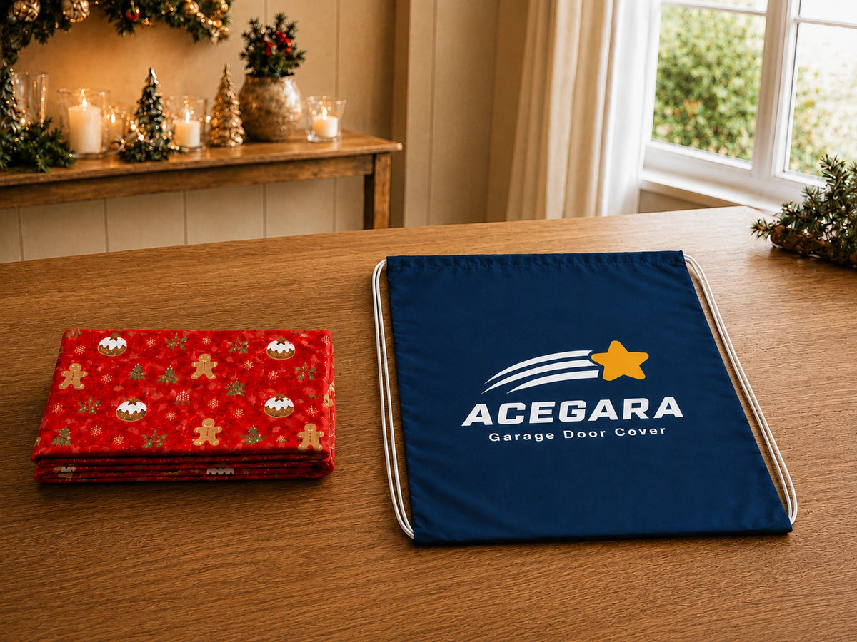 Folded Christmas garage door cover beside the included blue Acegara storage bag on a wooden table.